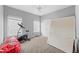 Bright bedroom with exercise bike and ample space at 12358 Muir Field Ct, Fayetteville, GA 30215