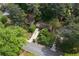 Aerial view of a residential neighborhood with houses, trees, and streets at 1305 Mclendon Dr, Decatur, GA 30033