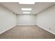 Finished basement room with carpeted floor at 38 Timberlost Trl, Suwanee, GA 30024