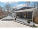 Gray house exterior with large deck and inviting backyard at 38 Timberlost Trl, Suwanee, GA 30024
