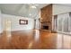 Large living room with hardwood floors, vaulted ceiling and fireplace at 38 Timberlost Trl, Suwanee, GA 30024
