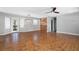 Dining area with wood floors, sliding barn door, and access to backyard at 3046 Marshall Fuller Rd, Dallas, GA 30157