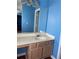 Clean bathroom with vanity, sink, and bathtub at 1306 Warsaw Rd, Roswell, GA 30076