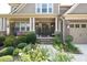 Front porch with columns, landscaping, and a bench at 5116 Barton Pass, Acworth, GA 30101