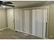 Bright living room with wood-look flooring and sliding glass doors at 1543 California Ave, Conley, GA 30288