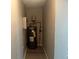 Utility room featuring a water heater and electrical panel at 1543 California Ave, Conley, GA 30288