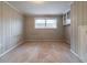 Simple bedroom with carpeting, built-in shelving, and a window at 2378 Tyler Way, Decatur, GA 30032