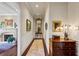 Bright hallway with hardwood floors and decorative molding at 1 Brookhaven Ne Dr # 301, Atlanta, GA 30319