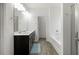 Modern bathroom featuring dual vanities, a soaking tub, and a separate shower at 111 Bryon Ln, Acworth, GA 30102