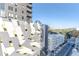 Modern parking garage and city street viewed from the balcony at 1280 W Peachtree Nw St # 1003, Atlanta, GA 30309