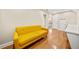 Bright home office with built in desk and yellow couch at 3420 Aviary Ln, Acworth, GA 30101