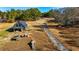 Aerial view of property showing barn and long driveway at 3625 Pointer Rd, Loganville, GA 30052