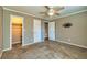 Spacious bedroom with large closet and ceiling fan at 3625 Pointer Rd, Loganville, GA 30052