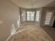 Bright dining area with bay window and tile flooring at 6959 Biscayne Blvd, Rex, GA 30273