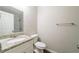 Clean and modern bathroom with granite countertop and updated fixtures at 5136 Huxley Rd, Stone Mountain, GA 30088