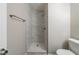 Clean bathroom featuring a marble tiled shower at 5136 Huxley Rd, Stone Mountain, GA 30088