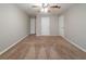 Spacious bedroom with neutral walls and plush carpeting at 5136 Huxley Rd, Stone Mountain, GA 30088