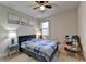 Cozy bedroom with a queen bed and an armchair at 4488 Mantova Dr, Buford, GA 30519