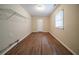 Laundry room with shelving, washer/dryer hookups, and a door to the outside at 2131 Meador Se Ave, Atlanta, GA 30315