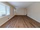 Bright and airy living room with large windows and wood-look flooring at 2131 Meador Se Ave, Atlanta, GA 30315