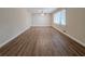 Spacious living room with abundant natural light and wood-look flooring at 2131 Meador Se Ave, Atlanta, GA 30315