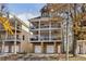 Three-story home with balconies, a three-car garage, and mature trees at 716 Connally Se St, Atlanta, GA 30315