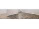 Spacious, finished basement with laminate flooring and white walls at 979 Cades Walk, Lawrenceville, GA 30045