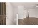 Foyer with wood-look flooring, white walls, and staircase at 979 Cades Walk, Lawrenceville, GA 30045
