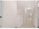Simple hallway leading to various rooms at 979 Cades Walk, Lawrenceville, GA 30045