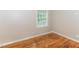 Vacant bedroom featuring hardwood floors and ample natural light at 2454 Spring Garden Sw Dr, Atlanta, GA 30315