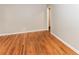 Empty room suitable for a bedroom or office with hardwood floors and neutral walls at 2454 Spring Garden Sw Dr, Atlanta, GA 30315