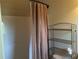 Small bathroom with shower/tub combo and neutral colors at 1213 Lavista Ne Rd, Atlanta, GA 30324