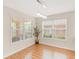 Bright breakfast nook with large windows and modern light fixture at 221 Prominent Loop, Mcdonough, GA 30253