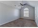 Bright bedroom with vaulted ceiling and window at 3867 Oakman Pl, Fairburn, GA 30213