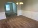 Spacious dining room with neutral walls and carpeting at 3951 Brookgate Ct, Ellenwood, GA 30294