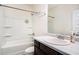 Clean bathroom with tub, shower, and vanity at 9004 Jim Purcell Dr, Covington, GA 30014