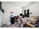 Unmade bed and gaming setup in this bedroom at 9004 Jim Purcell Dr, Covington, GA 30014