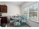 Bright breakfast nook with a built-in bench and window seat at 9004 Jim Purcell Dr, Covington, GA 30014