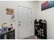Bright entryway with storage and coat hooks at 9004 Jim Purcell Dr, Covington, GA 30014