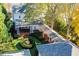 A backyard with a covered patio, fountain, and lush greenery at 2111 Cooper Lake Se Rd, Smyrna, GA 30080