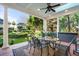 Relaxing covered patio with outdoor furniture and views of a landscaped backyard at 2111 Cooper Lake Se Rd, Smyrna, GA 30080