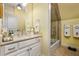Clean bathroom with shower and single vanity at 2111 Cooper Lake Se Rd, Smyrna, GA 30080