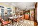 Dining room with charming chandelier and large windows overlooking the outdoors at 2111 Cooper Lake Se Rd, Smyrna, GA 30080