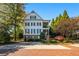 Inviting two-story residence featuring a brick facade and lush landscaping at 2111 Cooper Lake Se Rd, Smyrna, GA 30080