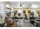 Spacious home gym with various exercise equipment and mirrored walls at 2111 Cooper Lake Se Rd, Smyrna, GA 30080
