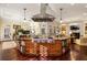 Open kitchen with large island, Wolf range, and plenty of natural light at 2111 Cooper Lake Se Rd, Smyrna, GA 30080
