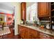 Additional kitchen prep area with granite counters, sink, and ample storage at 2111 Cooper Lake Se Rd, Smyrna, GA 30080