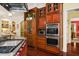 Gourmet kitchen featuring stainless steel appliances, wine fridge, and custom cabinetry at 2111 Cooper Lake Se Rd, Smyrna, GA 30080