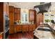 Chef's kitchen with stainless steel appliances, granite countertops, and wood cabinetry at 2111 Cooper Lake Se Rd, Smyrna, GA 30080
