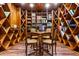 Custom library with a small table and chairs, bookshelves, and hardwood floors at 2111 Cooper Lake Se Rd, Smyrna, GA 30080